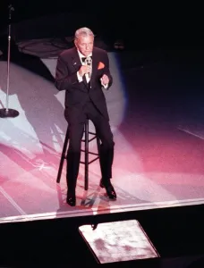 Frank Sinatra in concert sitting on high stool Ibrox July 1990 Glasgow