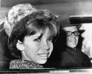 Frank Sinatra with his daughter Nancy in a car