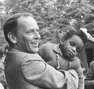 00303 Prints: Frank Sinatra seen here during a visit to Royal National College for the Blind at Norwood