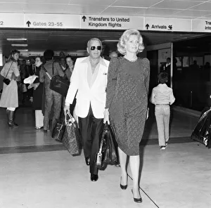 00303 Prints: Frank Sinatra and wife Barbara Marx seen here at Heathrow Airport prior to their depature