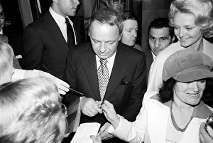 Autographs Prints: Frank Sintara and his girlfriend Barbara Marx leaving Claridges on the way to Mirabellas