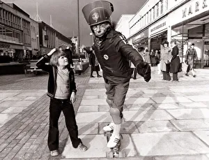 Frank Thomas, 66 year old pensioner, on a skateboard, skateboarding on the pavement in