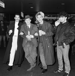 01173 Prints: Frankie Goes To Hollywood band members pictured at London Airport