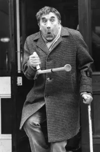 Frankie Howerd leaving hospital on crutches - February 1980 15 / 02 / 1980