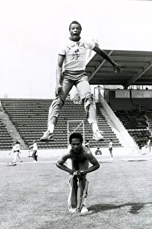 Og2012 Prints: Franklin Jacobs, high jumper leap-frogs sprinter Joe Thomas at Crystal Palace