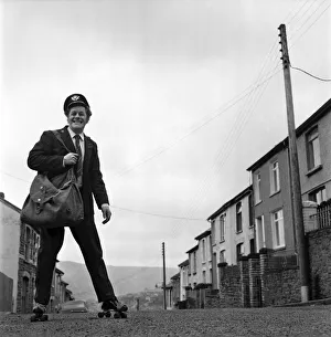 Fred Henderson, 49, makes speedy deliveries with the local post with balletic leaps along
