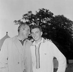 00879 Collection: Fred Perry (left) former Wimbledon champion talking with Stan Matthews Junior who is