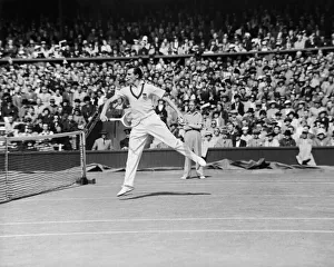 Grass Prints: Fred Perry (pictured) (GB) competing at The Wimbledon Tennis Championships against
