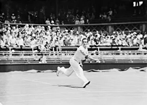 Grass Prints: Fred Perry playing a backhand shot at The Wimbledon Mens Tennis Championships 1935