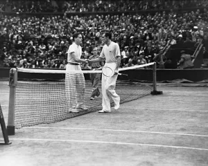 Greeting Prints: Fred Perry (right) and Gottfried von Cramm (left) of Germany shake hands at the net after