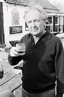 00350 Prints: Freddie Laker, enjoying a quick half pint in the garden of his local pub in the village