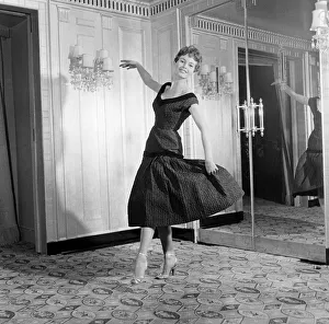 00506 Prints: French actress Brigitte Bardot who stars in the new film Doctor At Sea