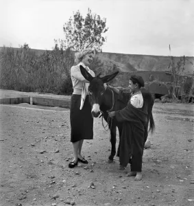 00009 Prints: A French actress meets a local boy and his donkey in the countryside of Morocco