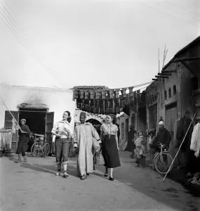 00009 Prints: Two French actresses walk through the streets and market square in Marrakech