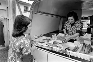 Delivery Prints: French housewife Mrs. Maria Quaranta buying food stuff from the delivery car