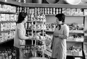 Cans Prints: French housewife Mrs Maria Quaranta at the local supermarket, shopping for food