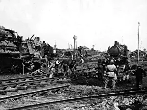 Allies Prints: French railway workers helping American soldiers to repair track in Cherbourg 1944 WW2