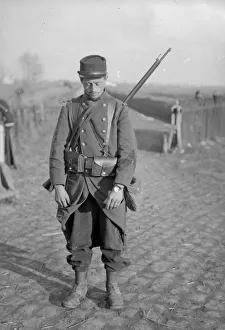 Cobbles Prints: French soldier who has placed around his wrist his identification disc instead of his