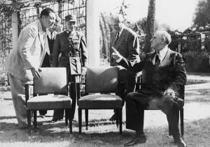 War Council Prints: A friendly argument between President Roosevelt and Generalissimo Chiang Kai-shek as to