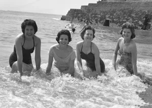 Friends enjoying so early summer sunshine on the south coast during the Whitsun Bank