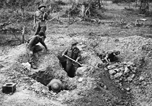 01438 Prints: On the fringes of the village Hottot near Tilly Sur Seulles troops dig themselves in