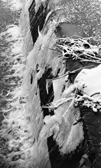 Cold Prints: Frozen River Cam, Ice forms on the Jesus Lock weir during a cold spell, Cambridge
