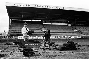 Grass Prints: Fulham manager Malcolm Macdonald with a roll of turf at Craven Cottage as the pitch is