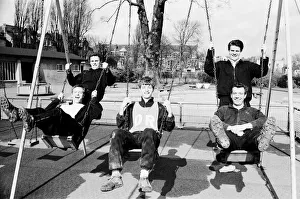 Fulham players on the swings after training was abandoned in London before their FA Cup