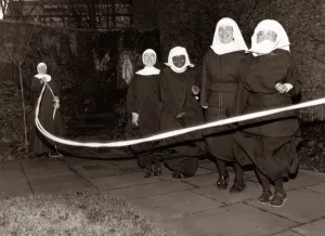 Excercise Prints: Fun loving nuns enjoying a game of skipping behind the walls of their convent