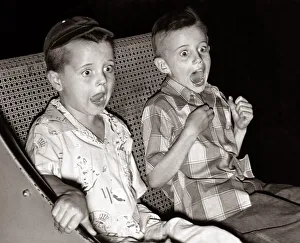 Funfair Rides - The Ghost Train, 2 young boys screaming as they take the Ghost Train