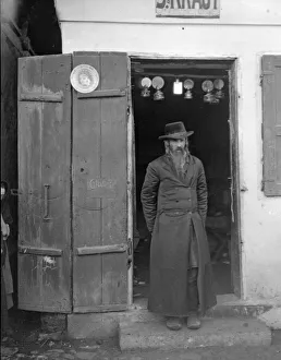 Former Ussr Prints: Galician trader seen here standing in the entrance to his Lamp shop in Halicz