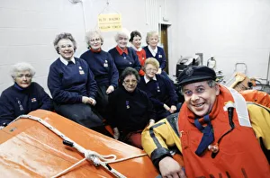 Crew Prints: Gareth Wigmore, a RNLI crew member pictured with women who helped raise money to build a
