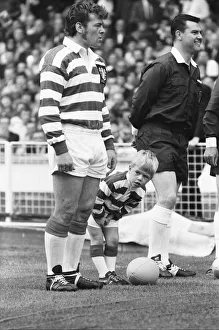 One Mid Adult Man Prints: Gary Ashcroft Leigh team mascot waits impatiently in the team line up to meet the guests