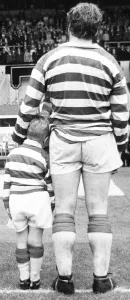 One Mid Adult Man Prints: Gary Ashcroft Leigh team mascot waits in the team line up to meet the guests of honour