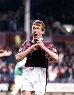 Scotland Prints: Gary Mackay Hearts football pulling jersey celebrating goal Hearts Hibs Hibernian