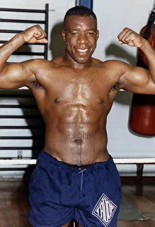 00130 Prints: Gary Mason Boxing Heavywieght boxer flexing his muscles