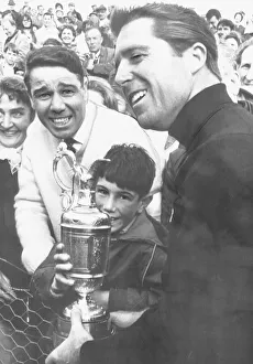Gary Player golfer holding trophy British Open Golf Champion claret jug crowd