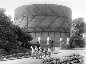The gas holder at Howdon rears its head over the countryside while only a few yards away