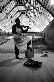00908 Prints: £13 a week carpenter Len Edmunds playing his homemade violin
