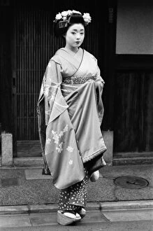 Girl Collection: Geisha girl, Katsuno, pictured outside her Geisha House in Kyoto, Japan, 8th March 1982