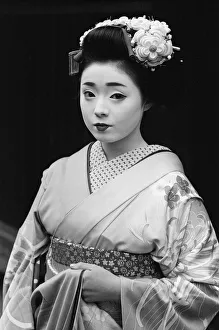 Geisha girl, Katsuno, pictured outside her Geisha House in Kyoto, Japan, 8th March 1982