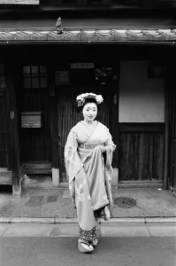 Geisha girl, Katsuno, pictured outside her Geisha House in Kyoto, Japan, 8th March 1982