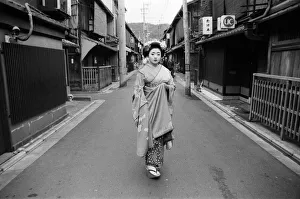01283 Prints: Geisha girl, Katsuno, pictured outside her Geisha House in Kyoto, Japan, 8th March 1982