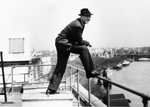 Carefree Prints: Gene Kelly Actor Entertainer admires the Thames from his hotel roof Dbase MSI