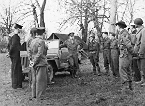 Driving Prints: General Dwight D Eisenhower seated in a jeep on his way to deliver his Christmas message
