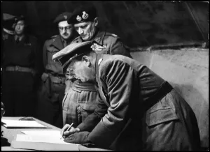 Sign Prints: General Kinzel (German General of Infantry) puts his signature to the surrender of