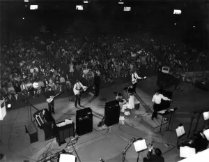 A general scene showing the Bee Gees during their performance at the Anaheim Convention