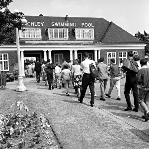 Swim Prints: General scenes of the crowds going into Finchley open air swimming pool