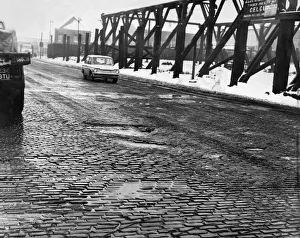Street Scenes Prints: General view along the Bootle section of the Dock Road in Liverpool showing the holes