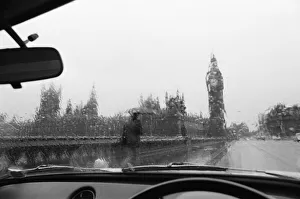 Raining Prints: General view of the Houses of Parliament and Big Ben taken through the rain washed window